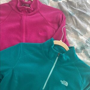 The North Face Pink and Teal Fleece Jackets